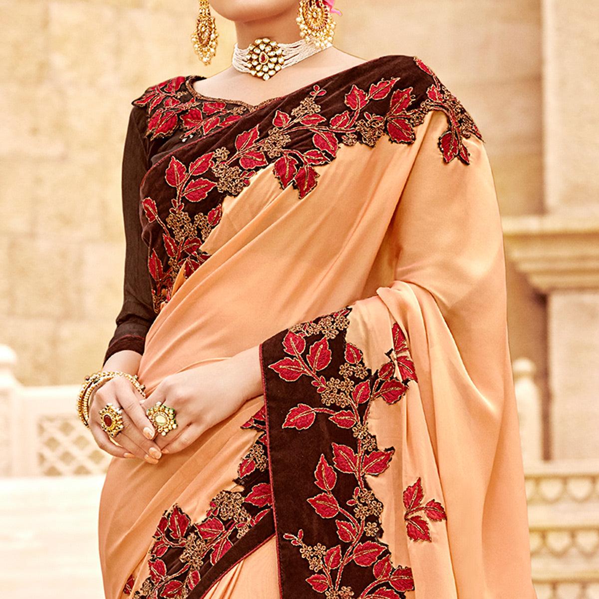Captivating Peach Colored Party Wear Embroidered Satin-Georegtte Saree