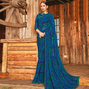 Captivating Rama & Blue Coloured Partywear Pure Georgette Floral Printed Saree With Fancy Lace Border