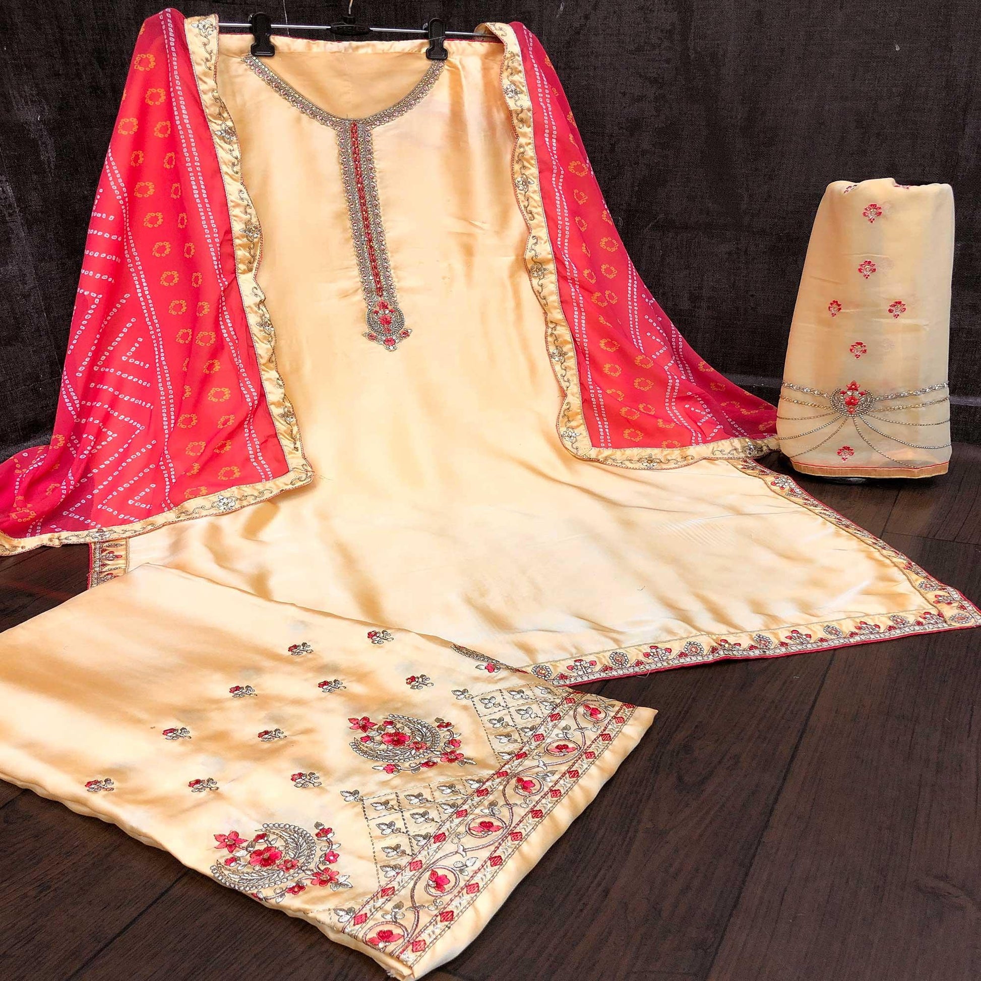 Captivating Yellow Colored Partywear Embroidered Muslin Satin Gharara Suit With Palazzo