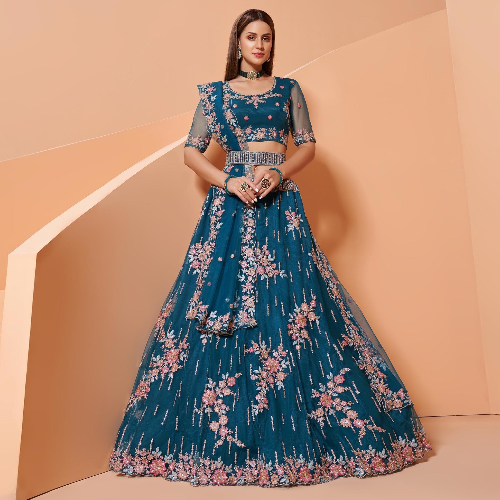 Cerulean Blue Partywear Floral Embroidered Embellished Net Lehenga Choli