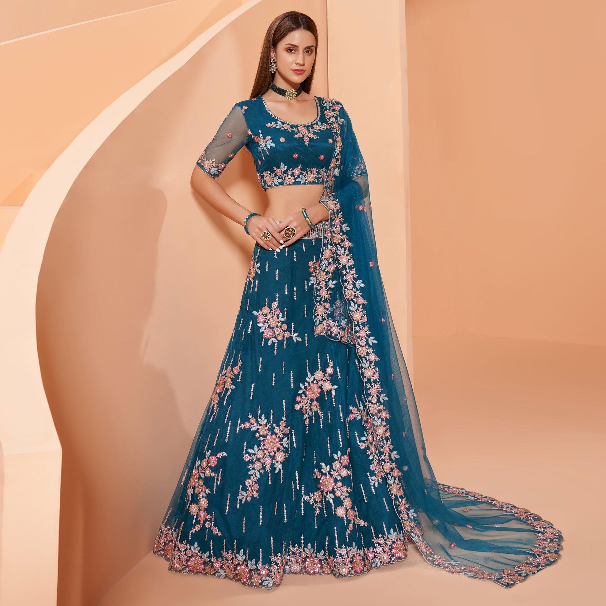 Cerulean Blue Partywear Floral Embroidered Embellished Net Lehenga Choli