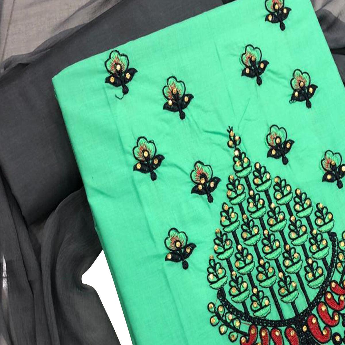 Charming Aqua Green Colored Casual Wear Embroidered Cotton Dress Material