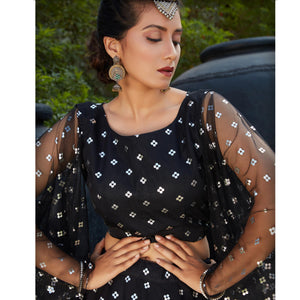 Charming Black Coloured Metallic Foil Printed Net Lehenga Choli