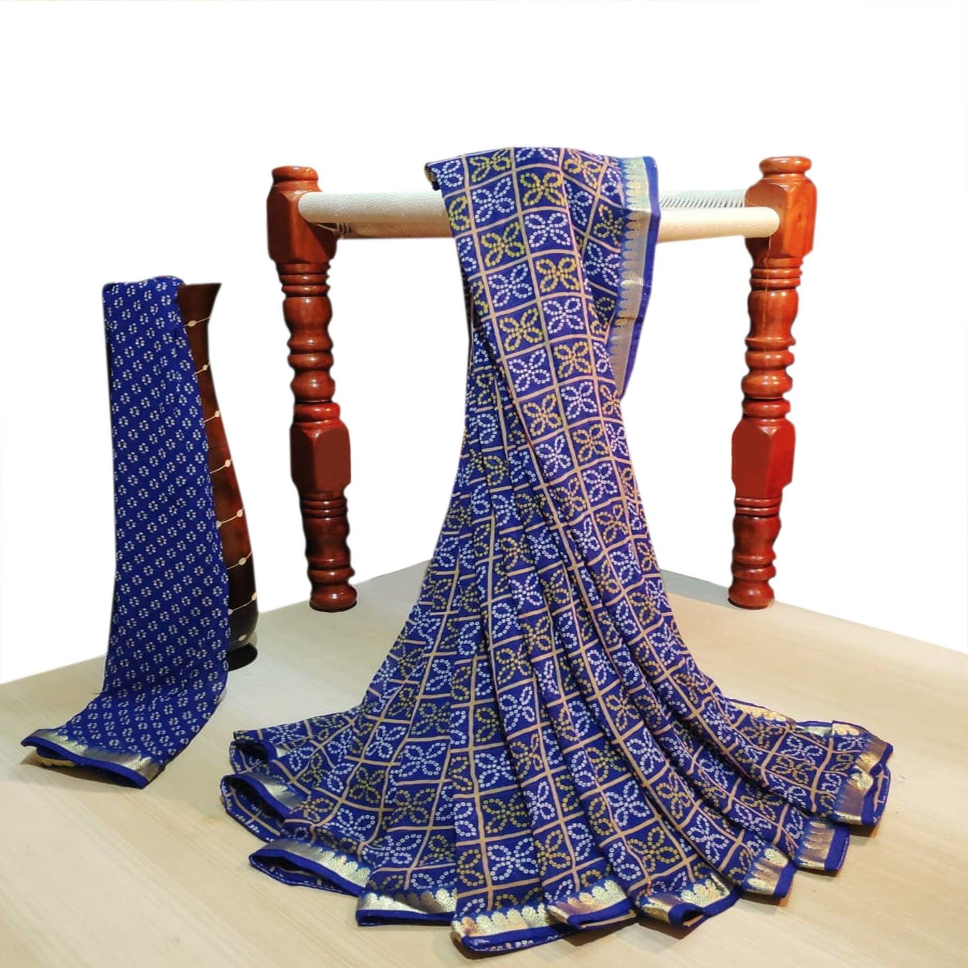 Charming Blue Colored Casual Wear Bandhani Printed Georgette Saree