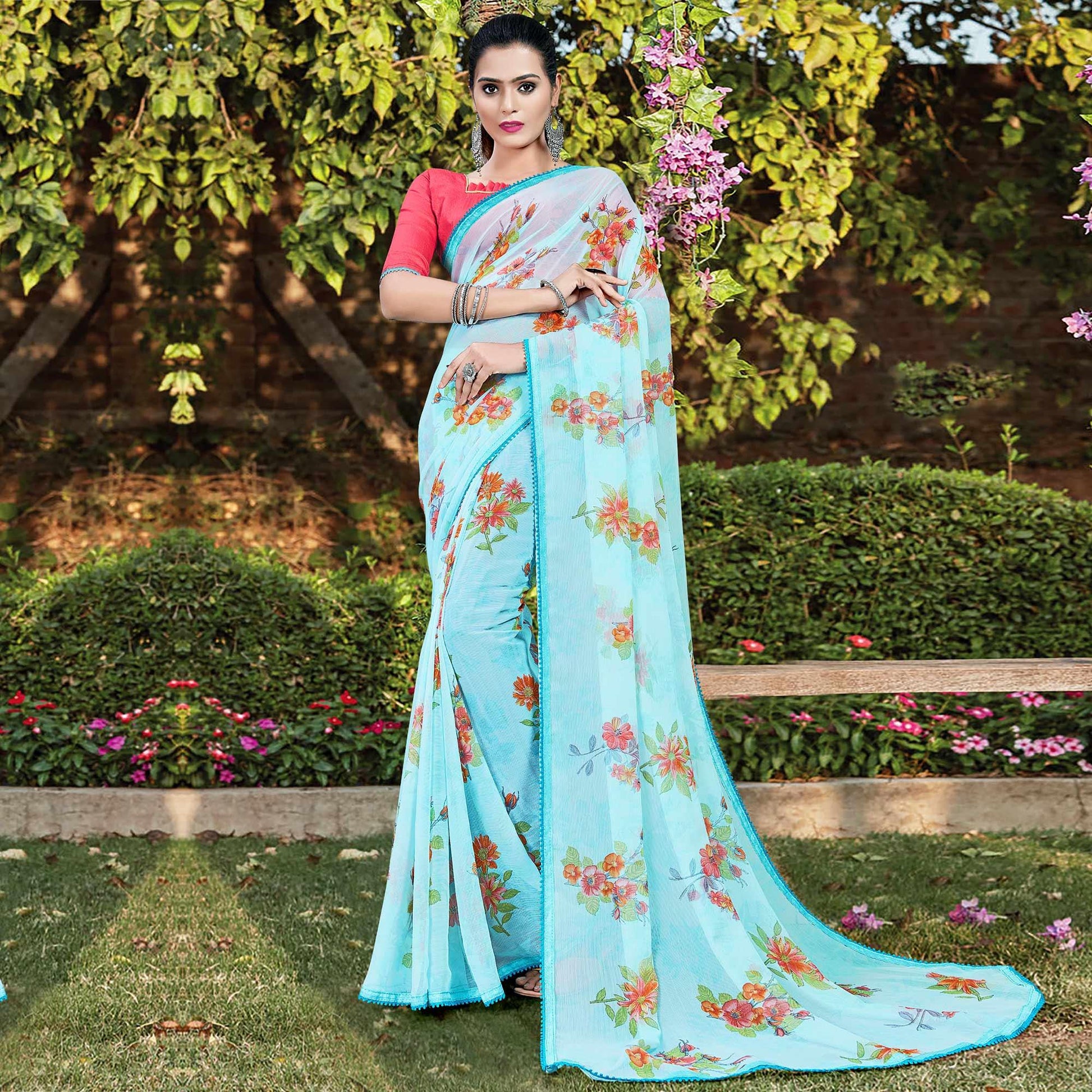 Charming Blue Colored Casual Wear Floral Printed Chiffon Saree
