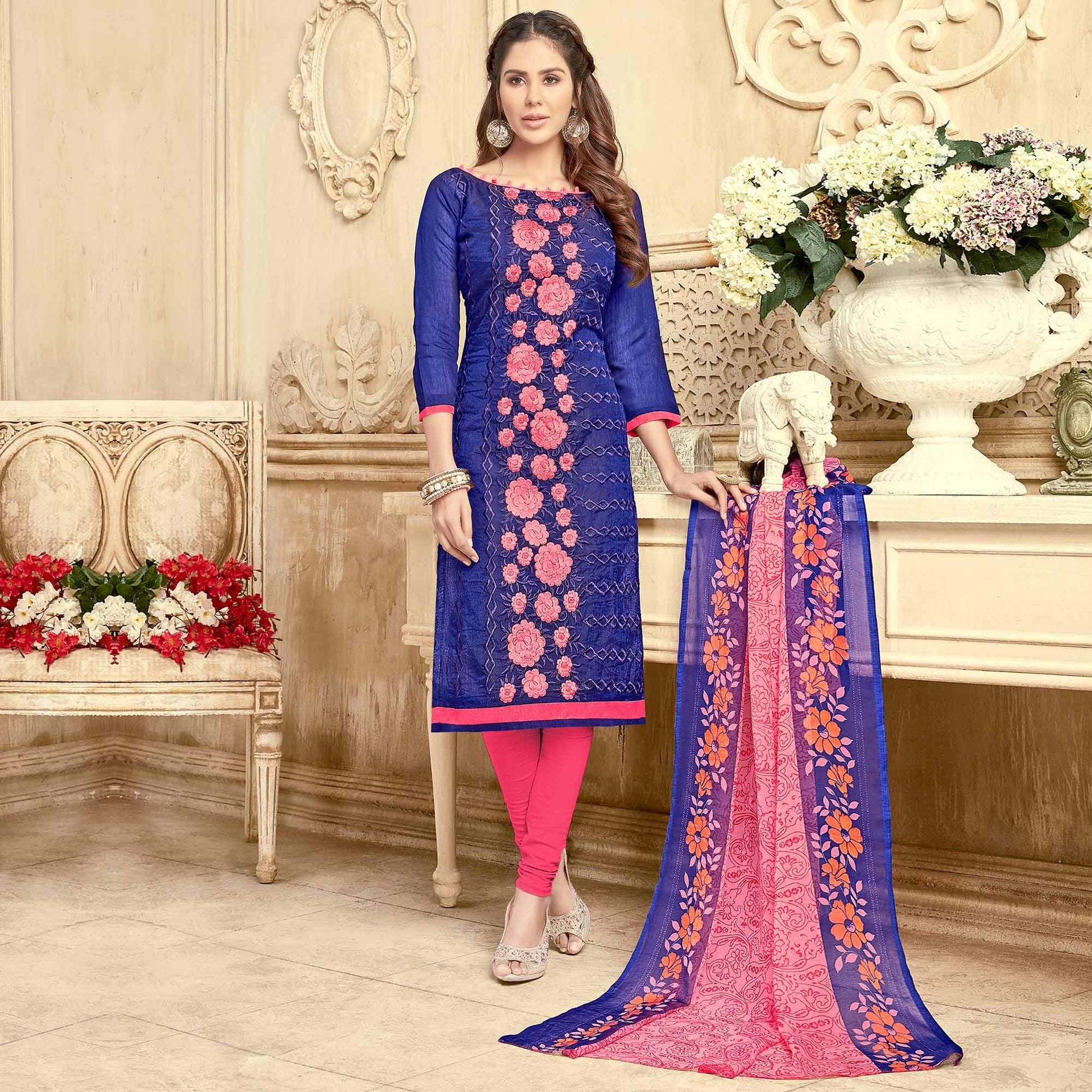 Charming Blue Colored Partywear Embroidered Chanderi Suit