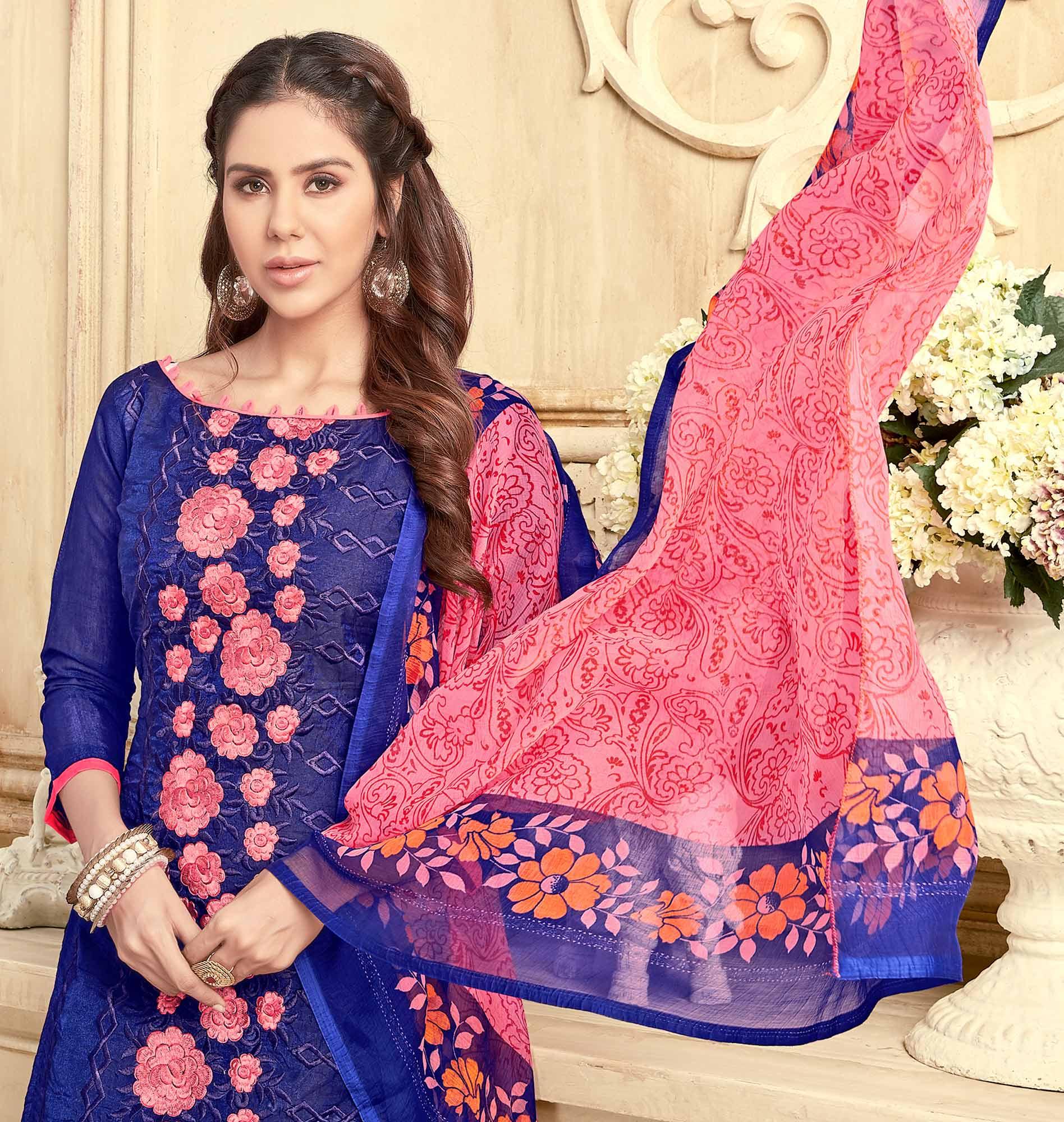 Charming Blue Colored Partywear Embroidered Chanderi Suit