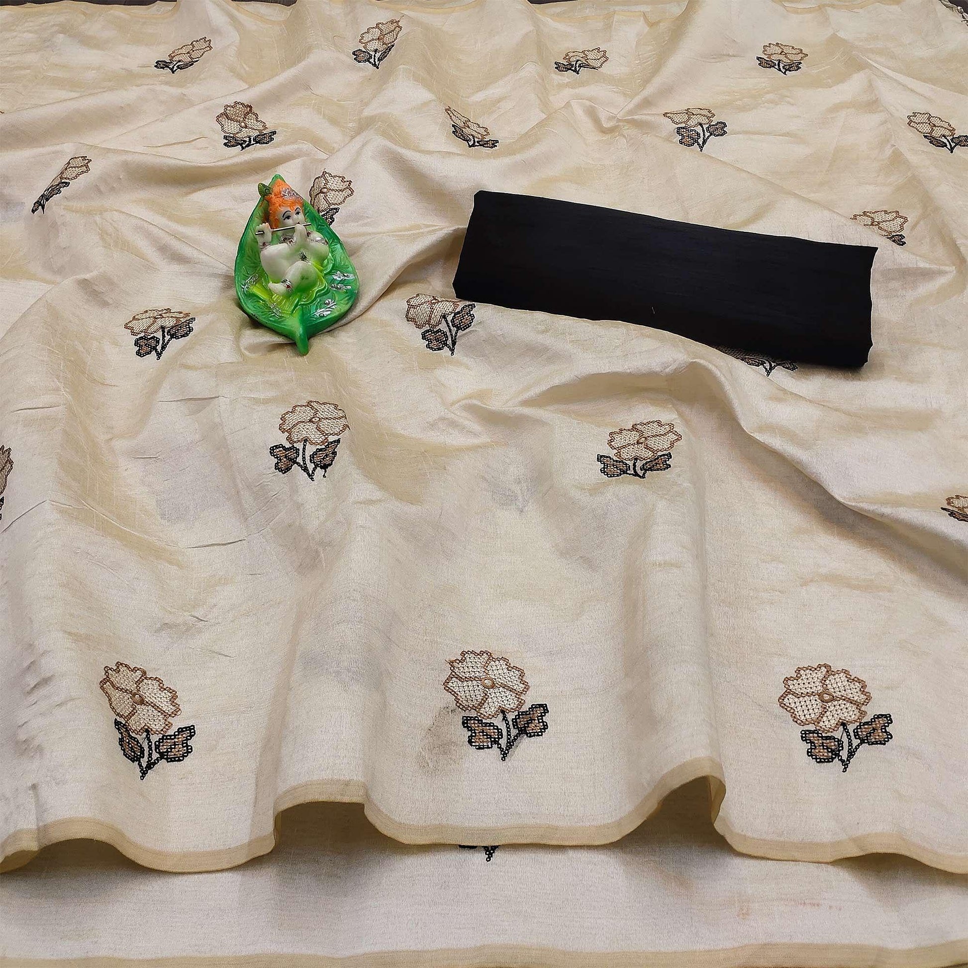 Charming Cream Colored Festive Wear Embroidered Silk Saree