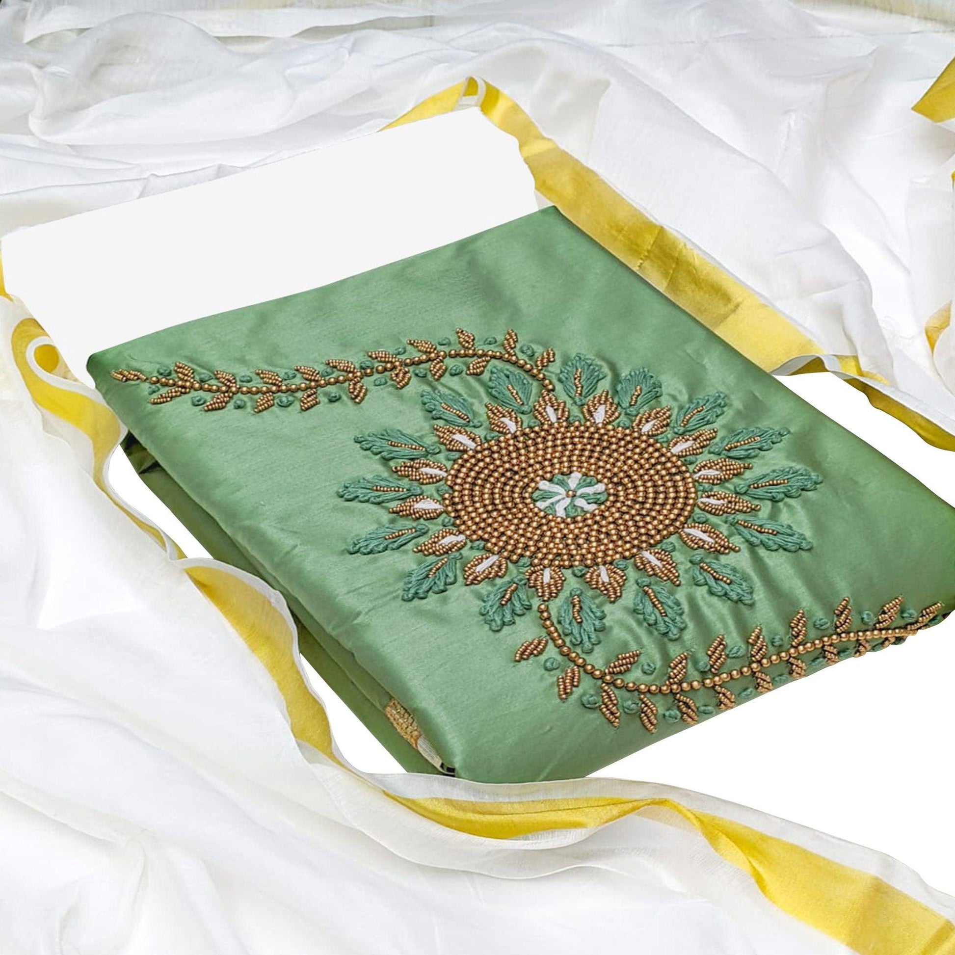 Charming Green Colored Casual Wear Embroidered Cotton Dress Material