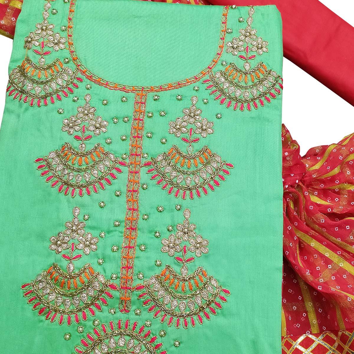 Charming Green Colored Partywear Embroidered Cotton Dress Material