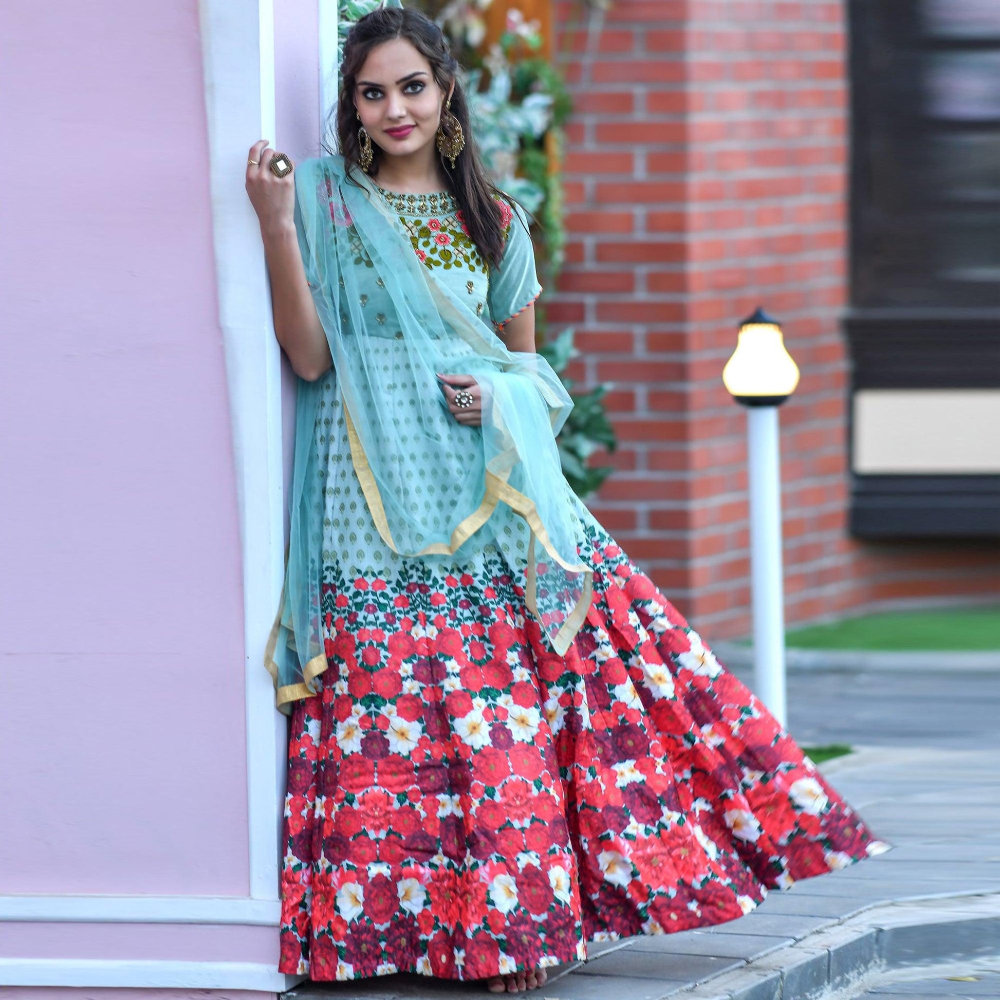 Charming Mint Blue Colored Partywear Embroidered Silk Gown