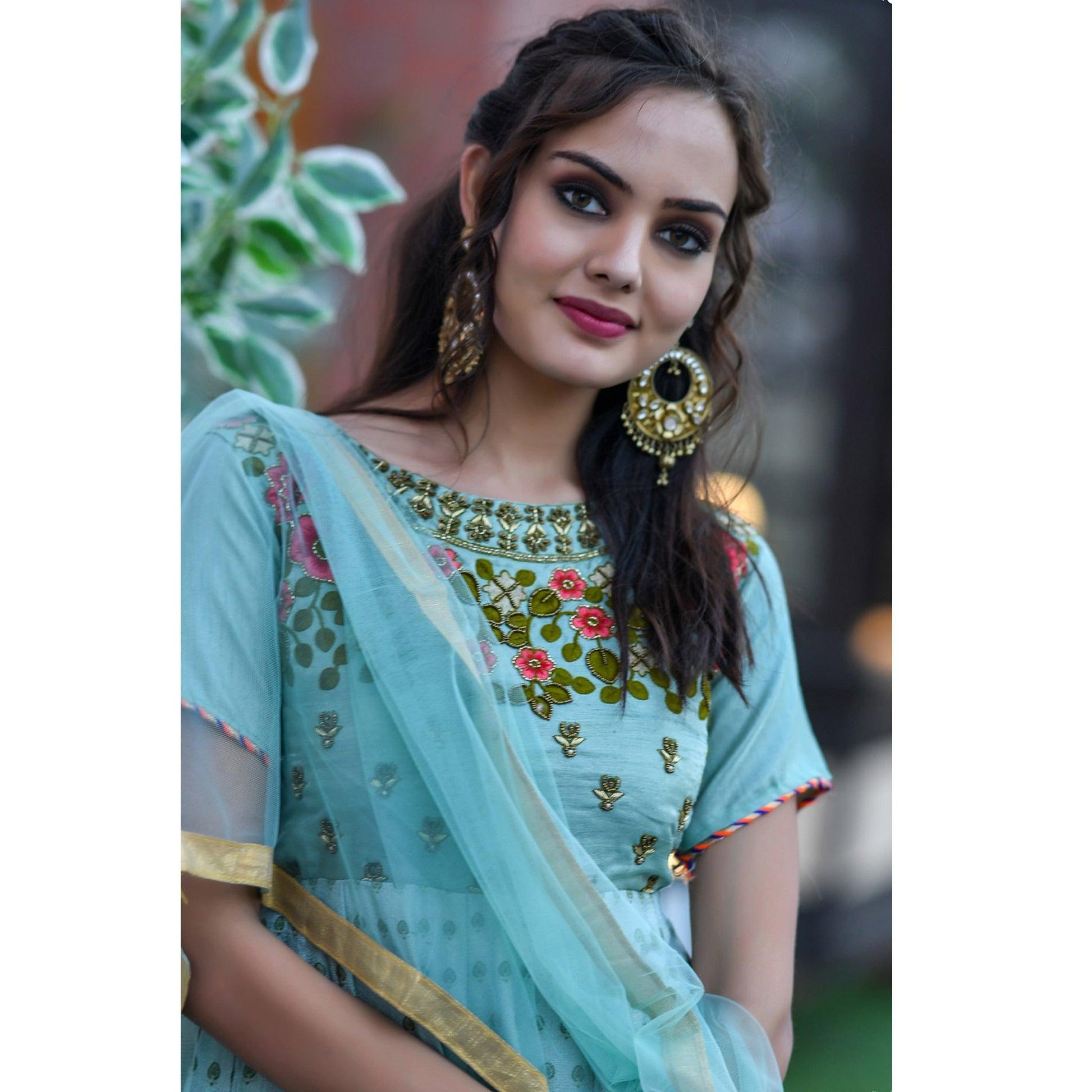 Charming Mint Blue Colored Partywear Embroidered Silk Gown
