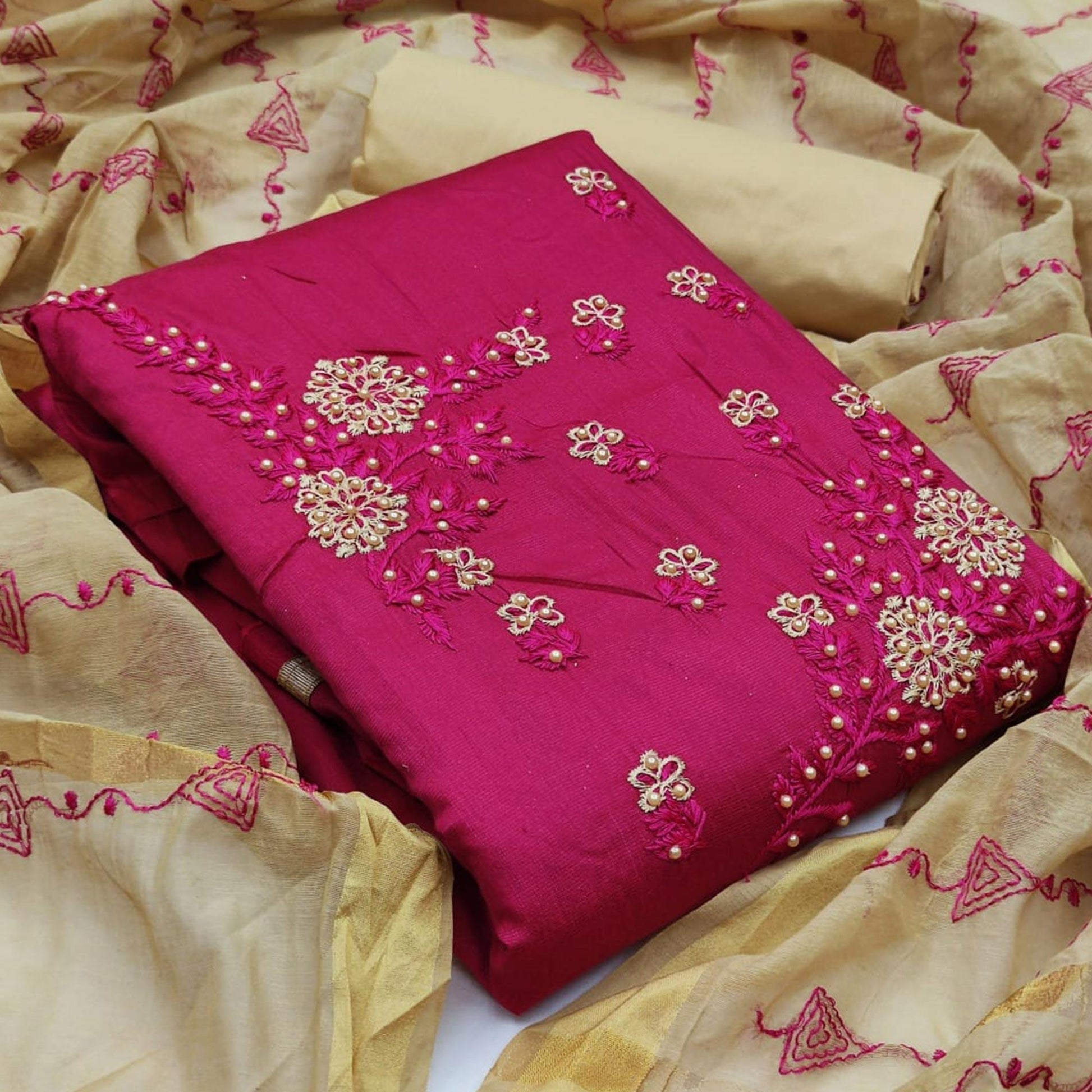 Charming Rani Pink Colored Casual Wear Embroidered Cotton Dress Material