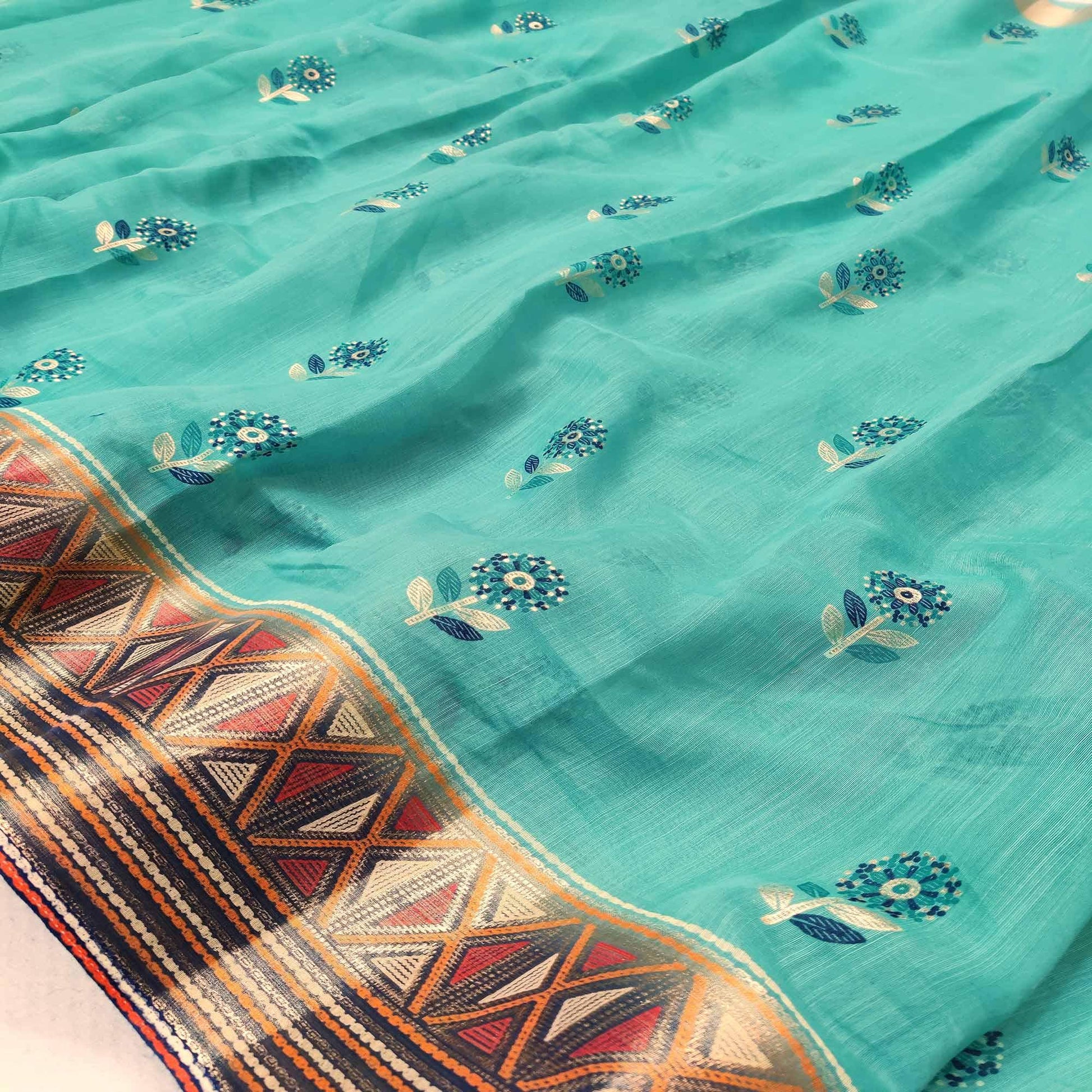 Charming Sea Green Colored Festive Wear Foil Printed Cotton Silk Saree