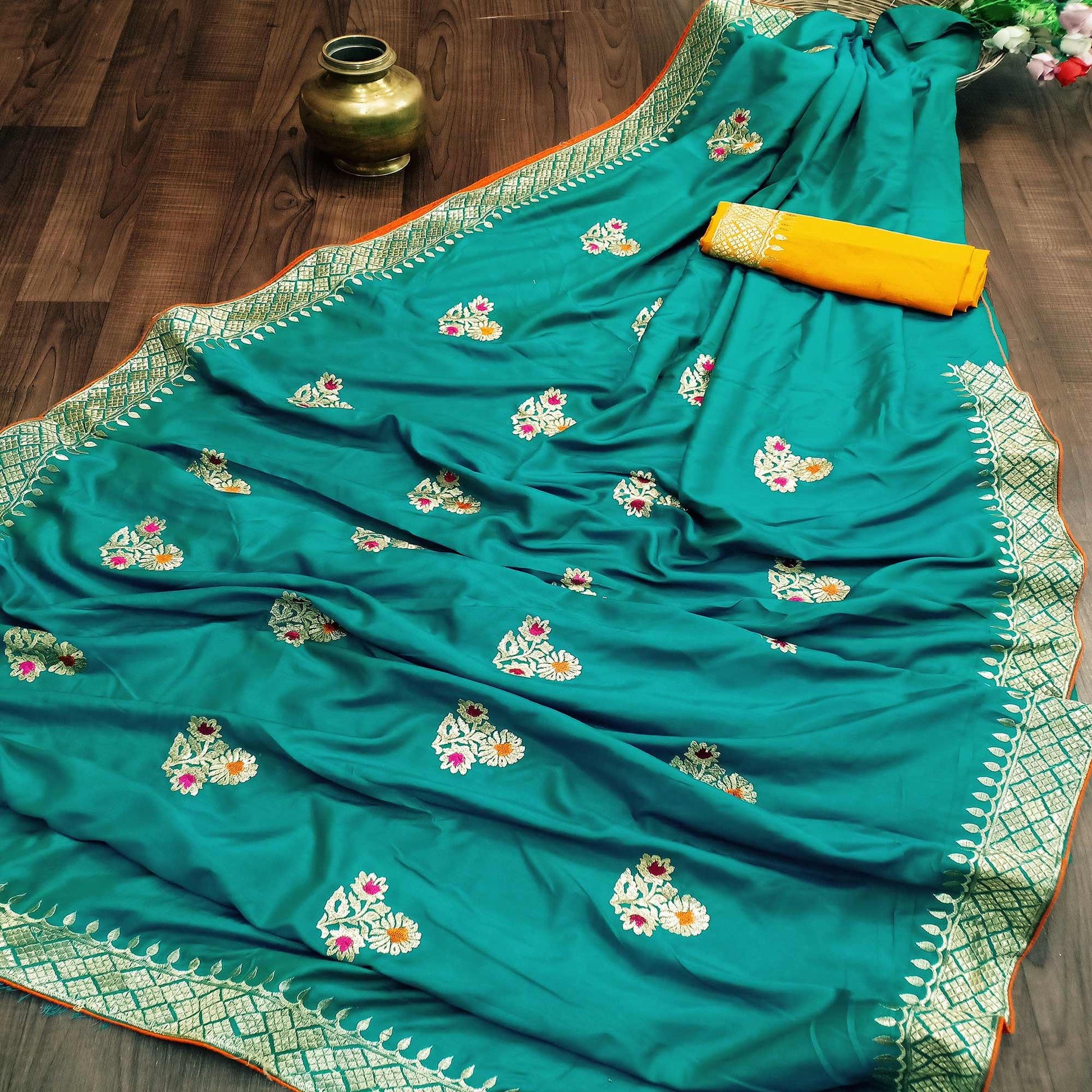 Charming Turquoise Colored Festive Wear Woven Dola Silk Saree