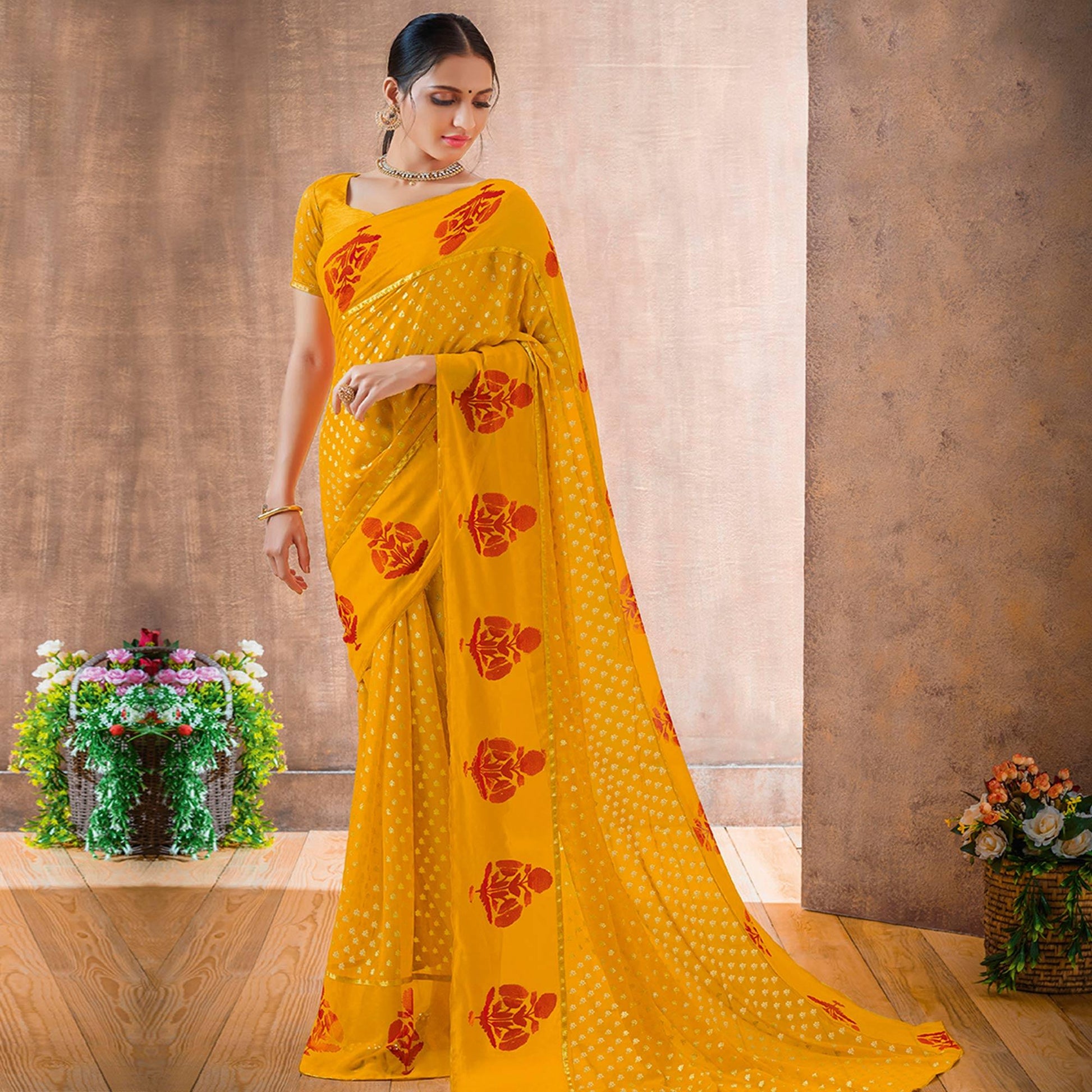 Charming Yellow Colored Festive Wear Foil Printed Georgette Saree
