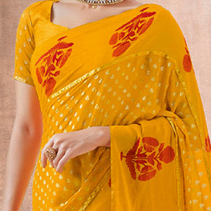 Charming Yellow Colored Festive Wear Foil Printed Georgette Saree