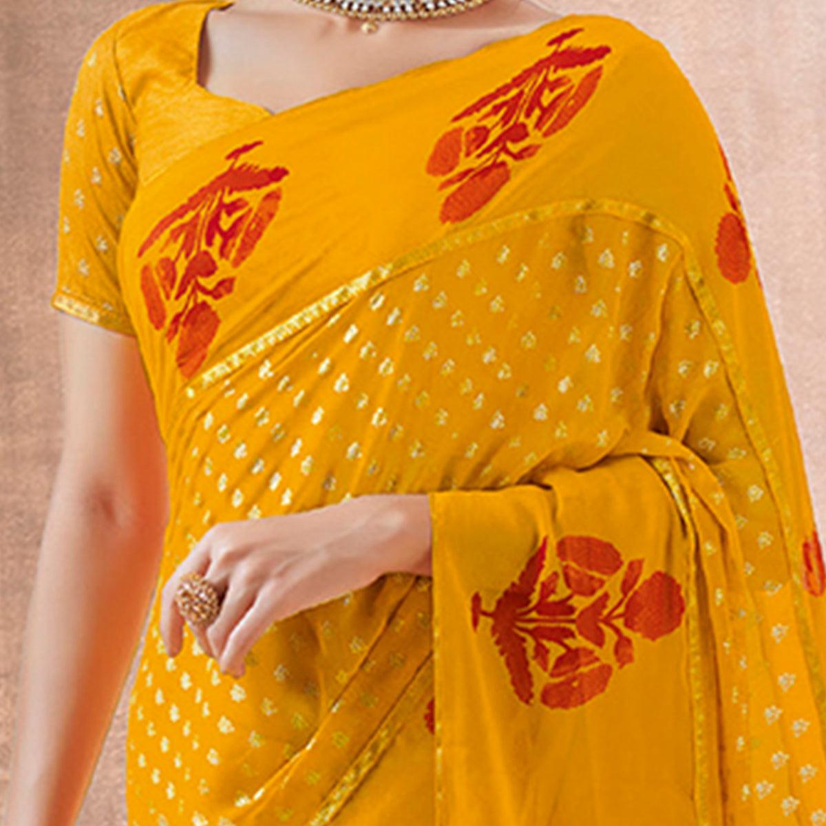 Charming Yellow Colored Festive Wear Foil Printed Georgette Saree
