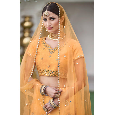 Charming Yellow Wedding Wear Zari Embroidery Heavy Silk Lehenga Choli