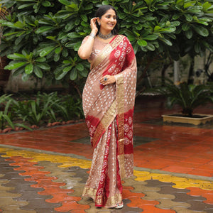 Chikoo Bandhani Printed With Woven Border Art Silk Saree