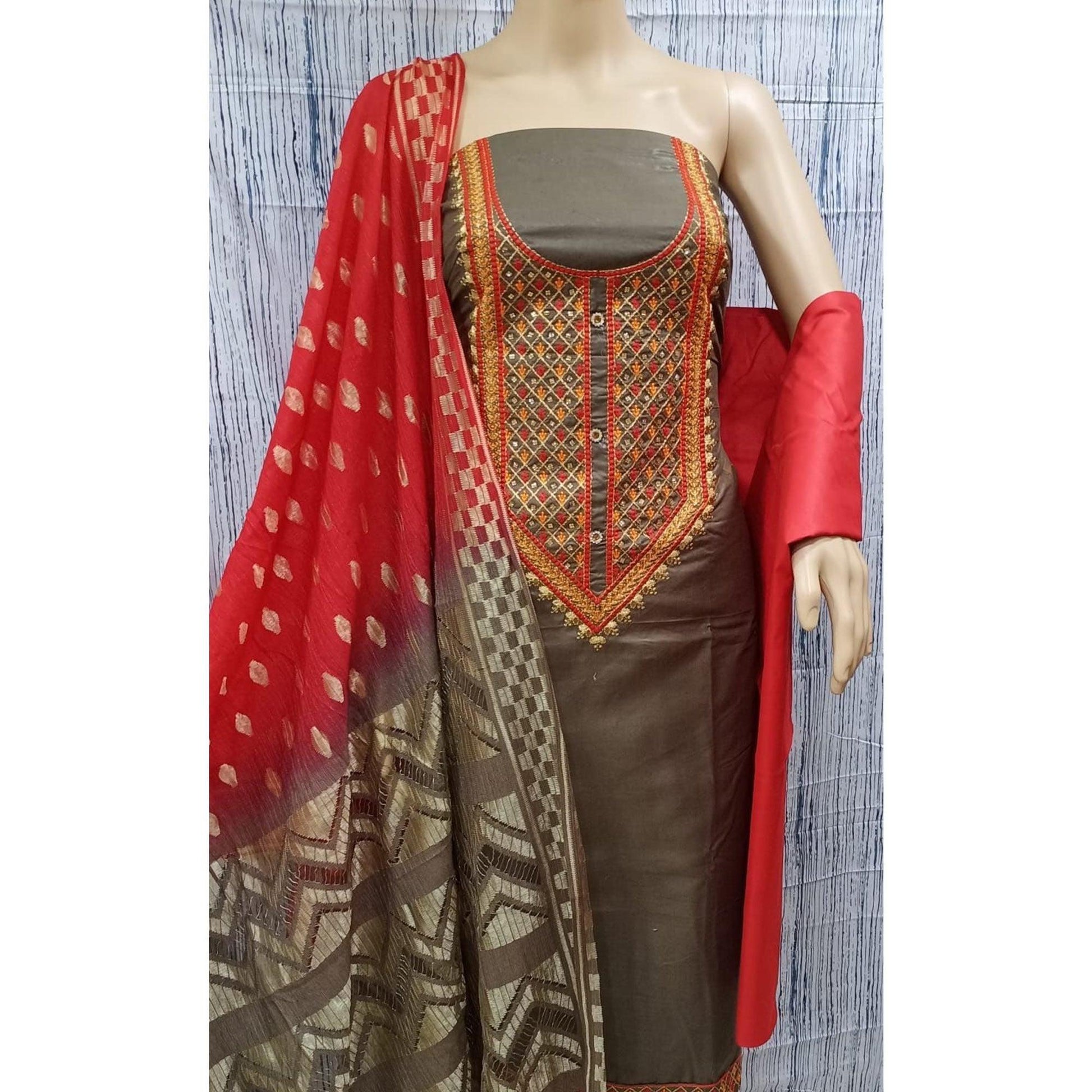 Chikoo Casual Wear Embroidered Cotton Dress Material