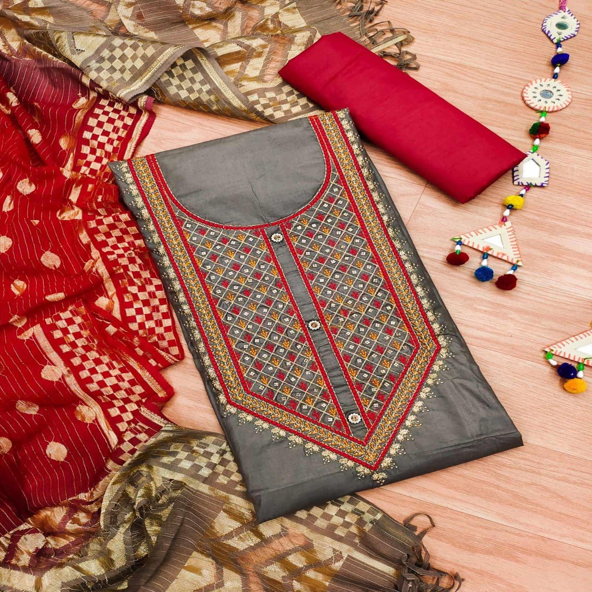 Chikoo Casual Wear Embroidered Cotton Dress Material