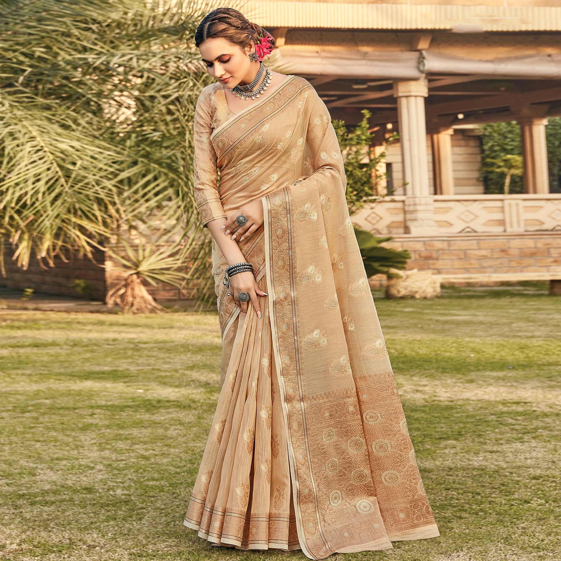 Chikoo Festive Wear Floral Woven Linen Saree