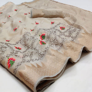 Chikoo Festive Wear Woven Organza Saree With Floral Embroidery Butta Work
