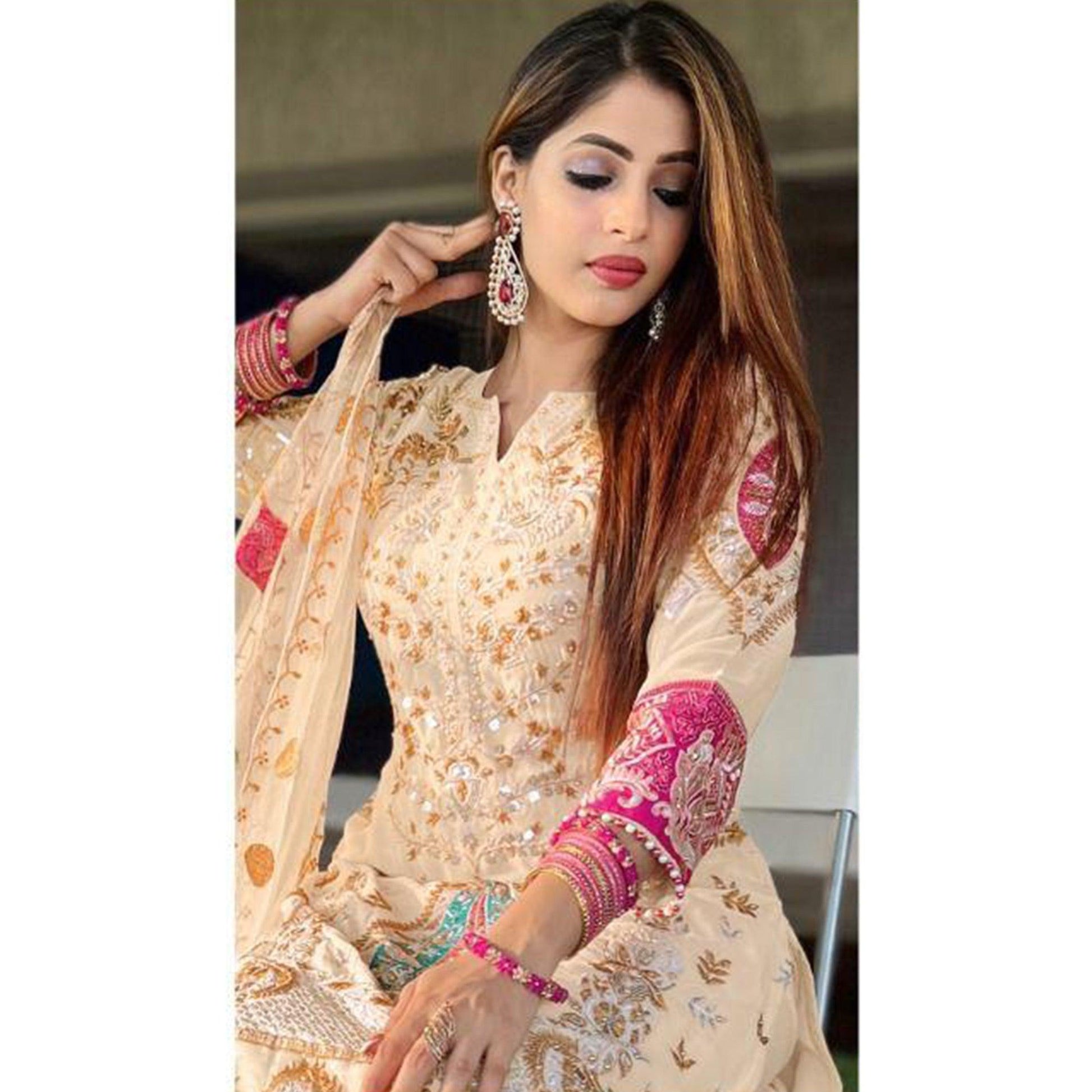 Chikoo Floral Sequins Embroidered Georgette Pakistani Suit