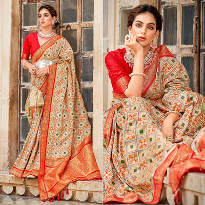 Chikoo Woven Art Silk Patola Saree With Tassels