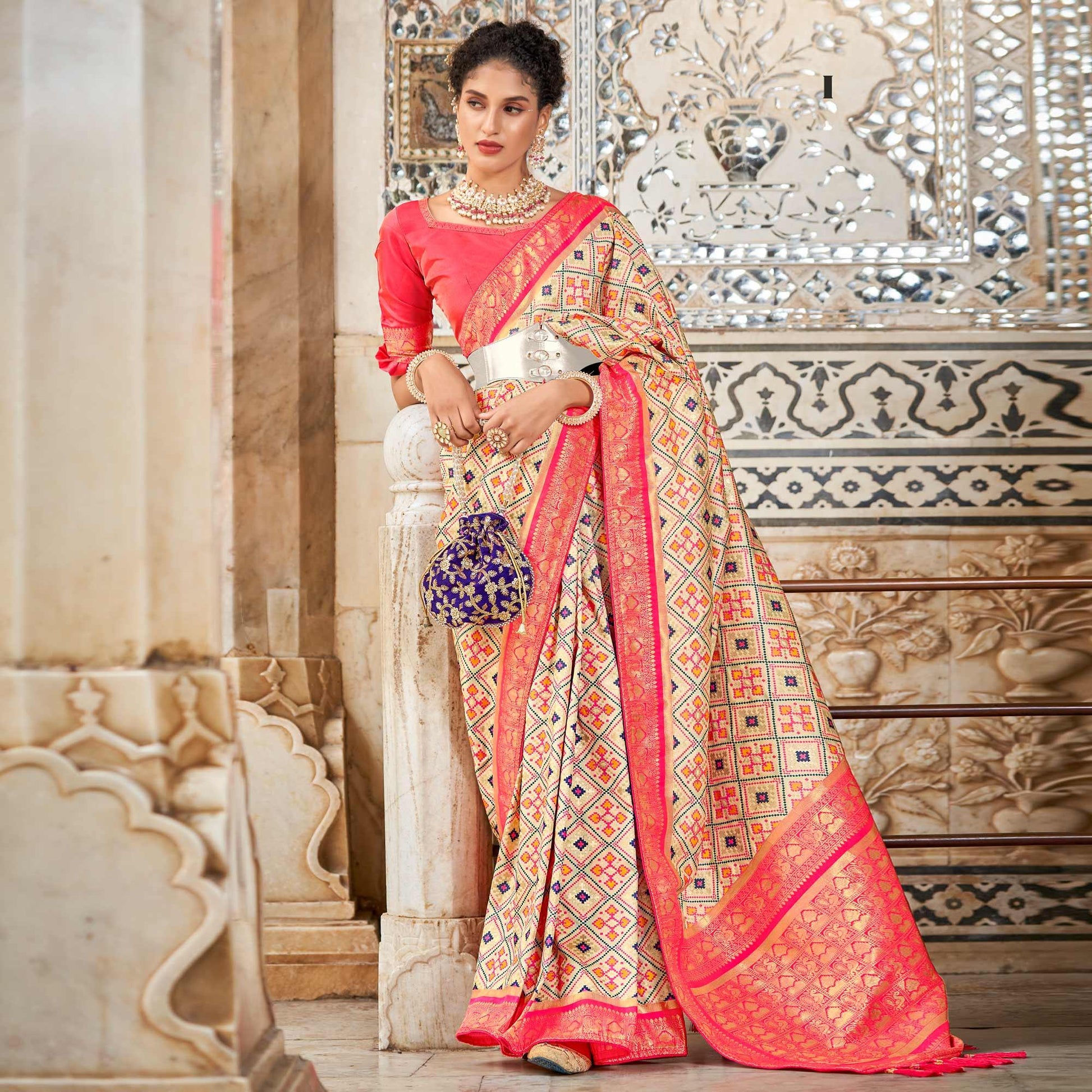 Chikoo Woven Art Silk Patola Saree With Tassels