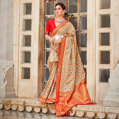 Chikoo Woven Art Silk Patola Saree With Tassels