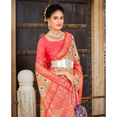 Chikoo Woven Art Silk Patola Saree With Tassels