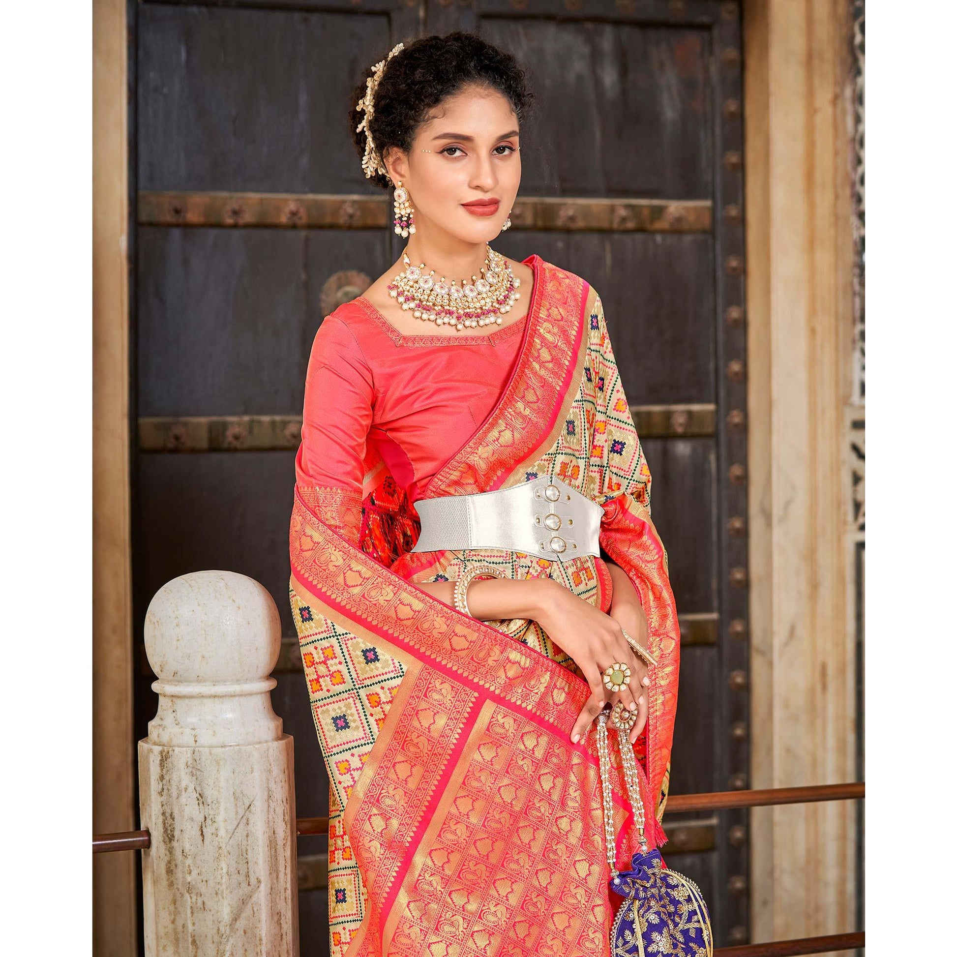 Chikoo Woven Art Silk Patola Saree With Tassels