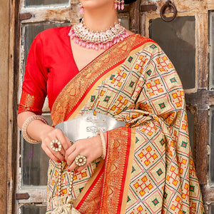 Chikoo Woven Art Silk Patola Saree With Tassels