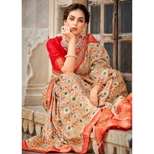 Chikoo Woven Art Silk Patola Saree With Tassels