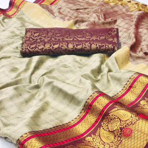 Chikoo Woven Cotton Silk Saree With Tassels