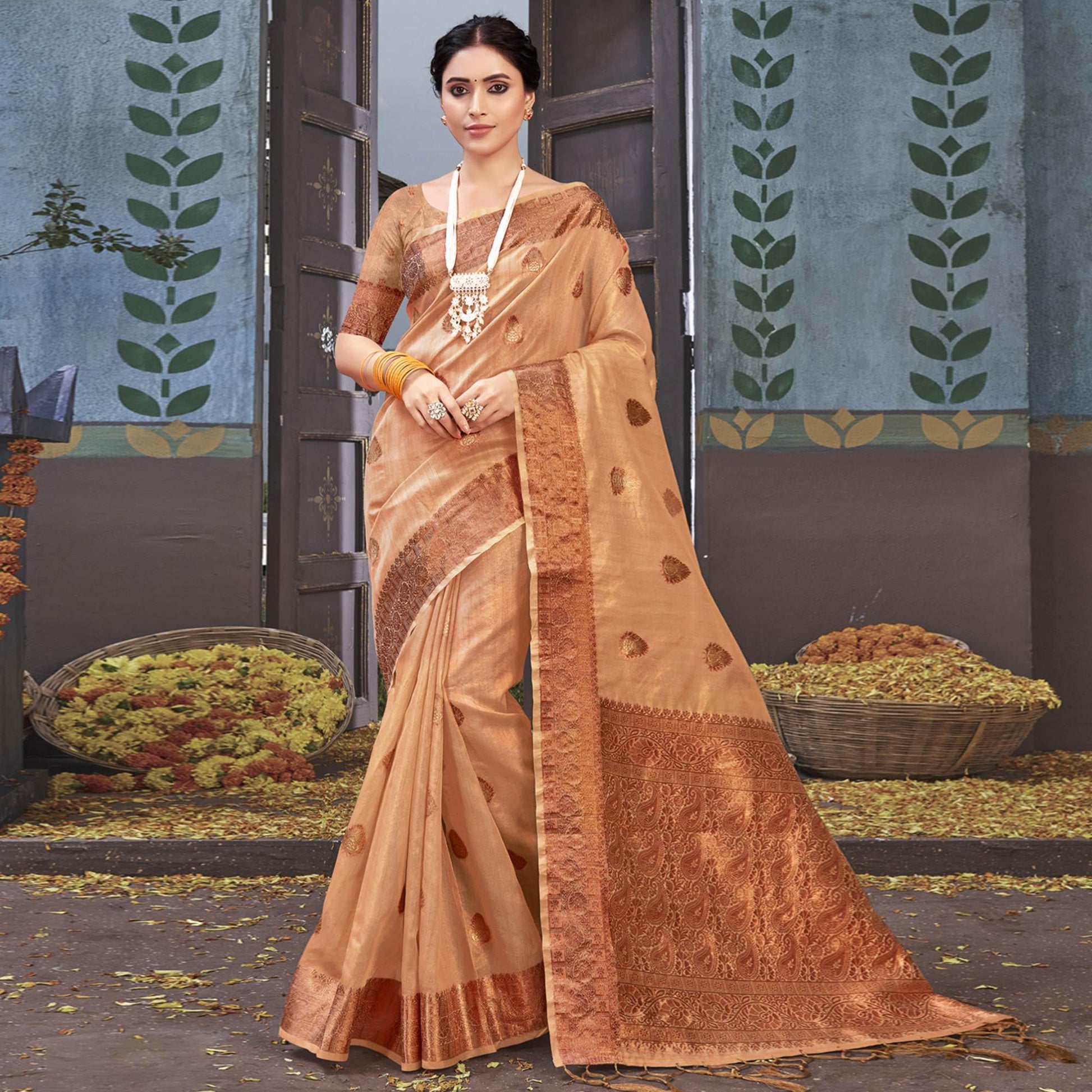 Chikoo Woven Organza Saree With Tassels