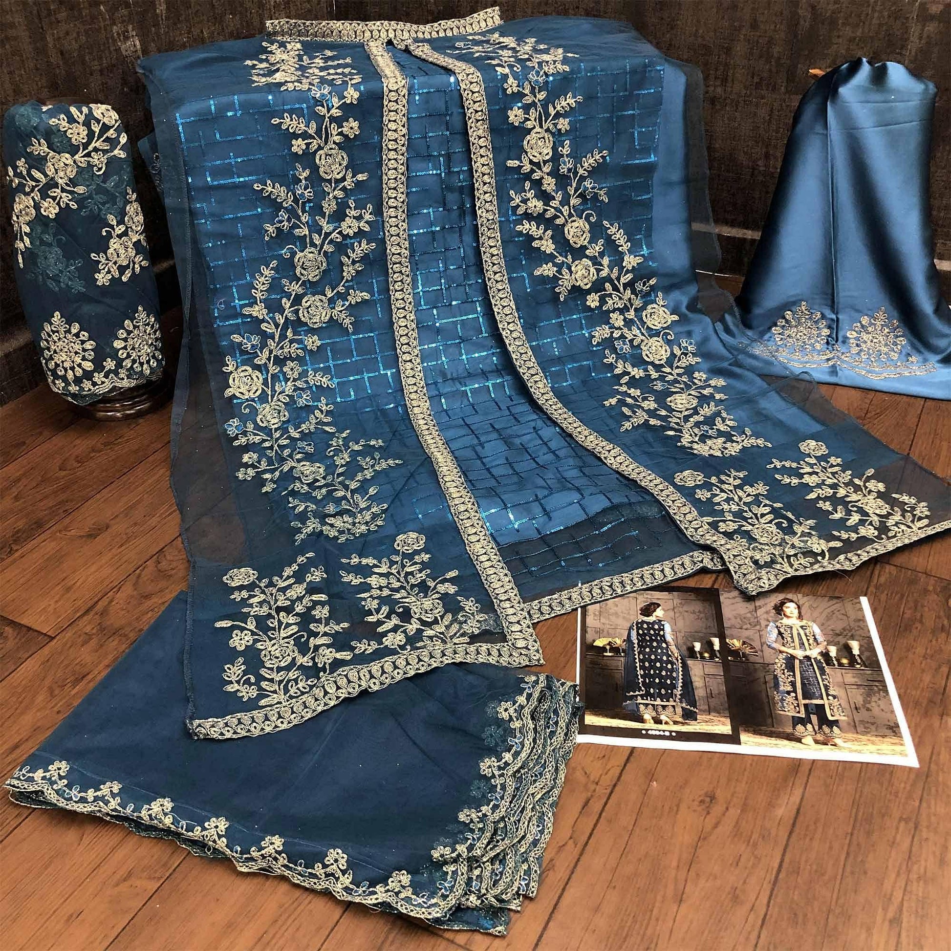 Classy Aqua Blue Coloured Party Wear Floral Embroidered Butterfly Net Pakistani Straight Suit
