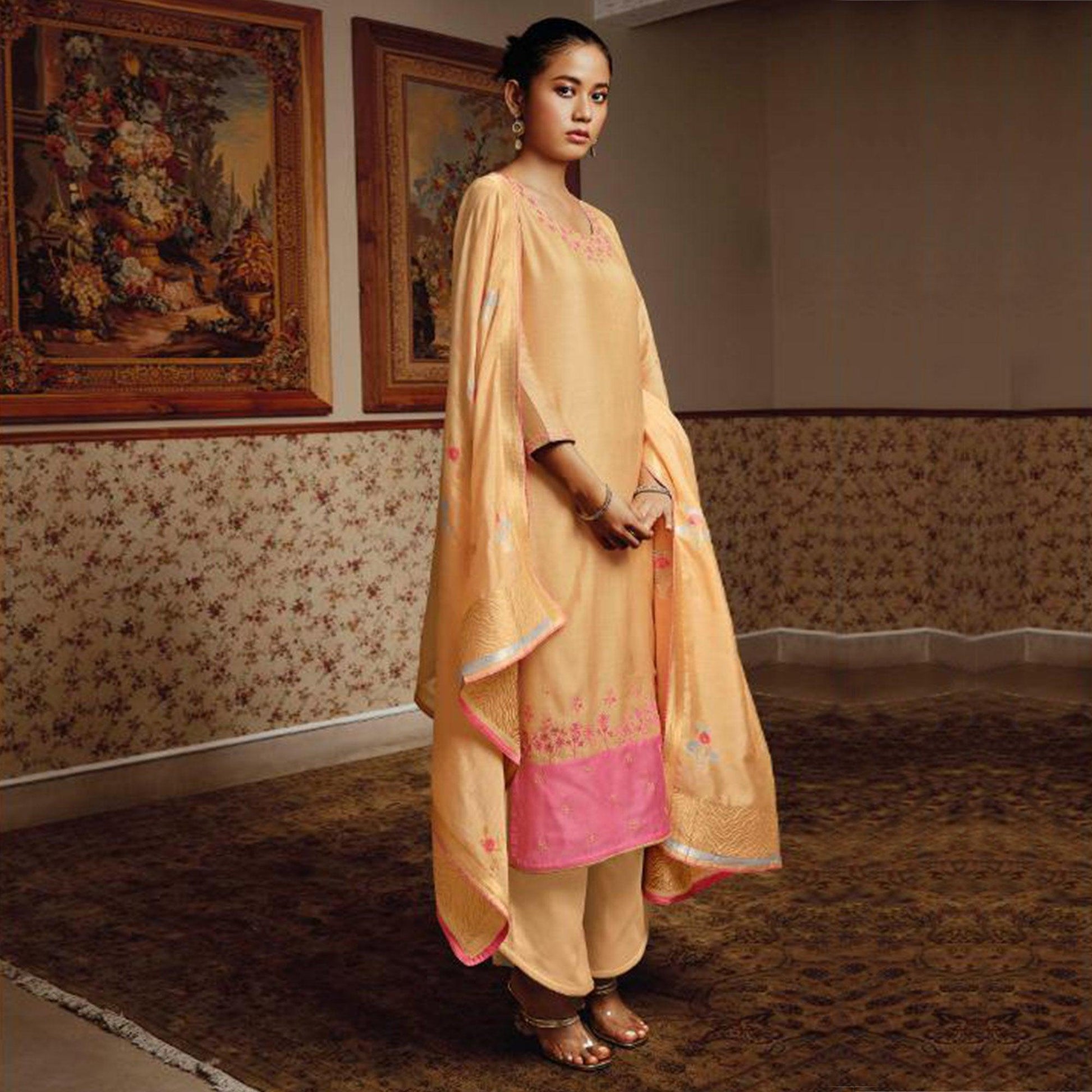 Classy Light Orange Colored Partywear Embroidered Pure Silk Suit