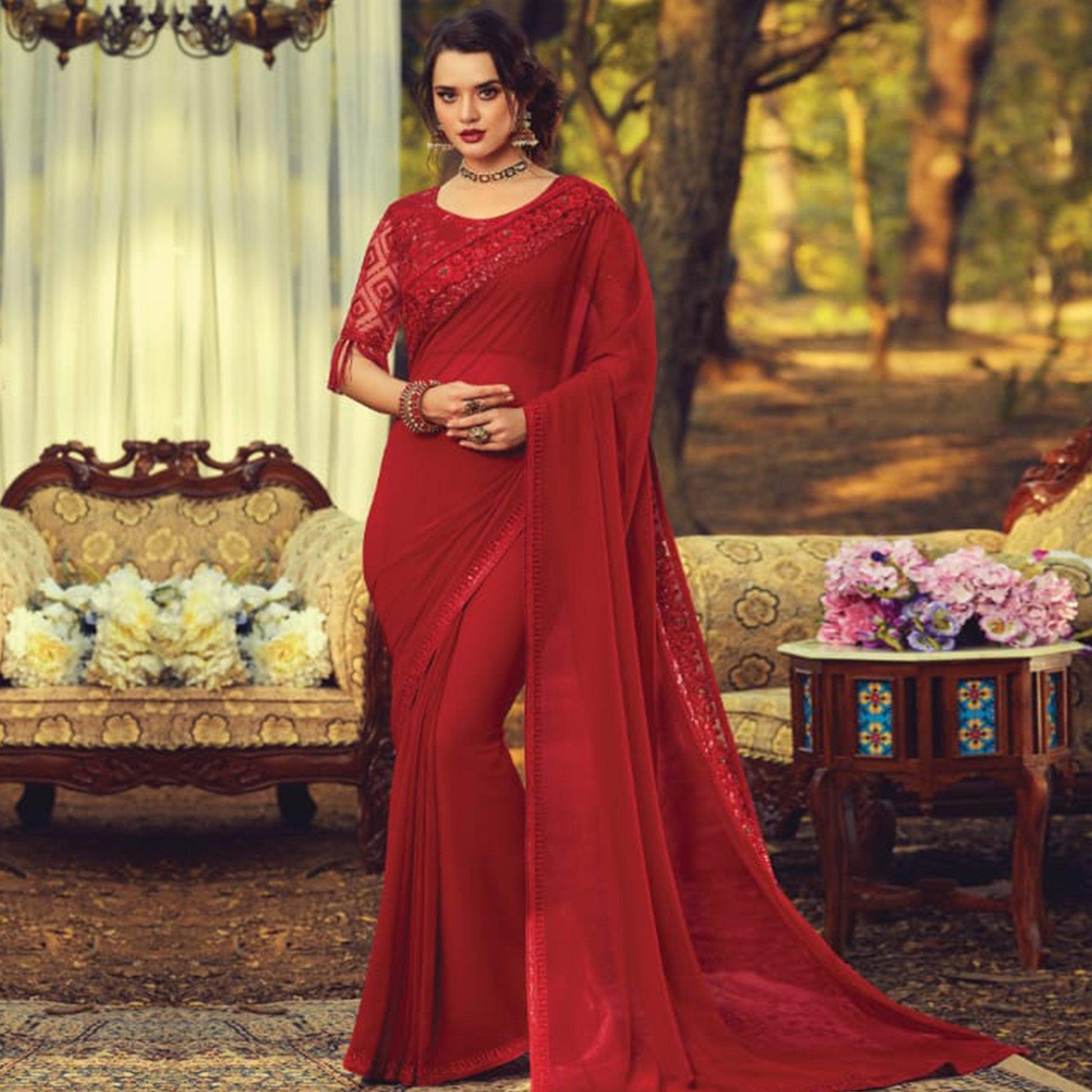 Classy Maroon Colored Partywear Embroidered Georgette Saree