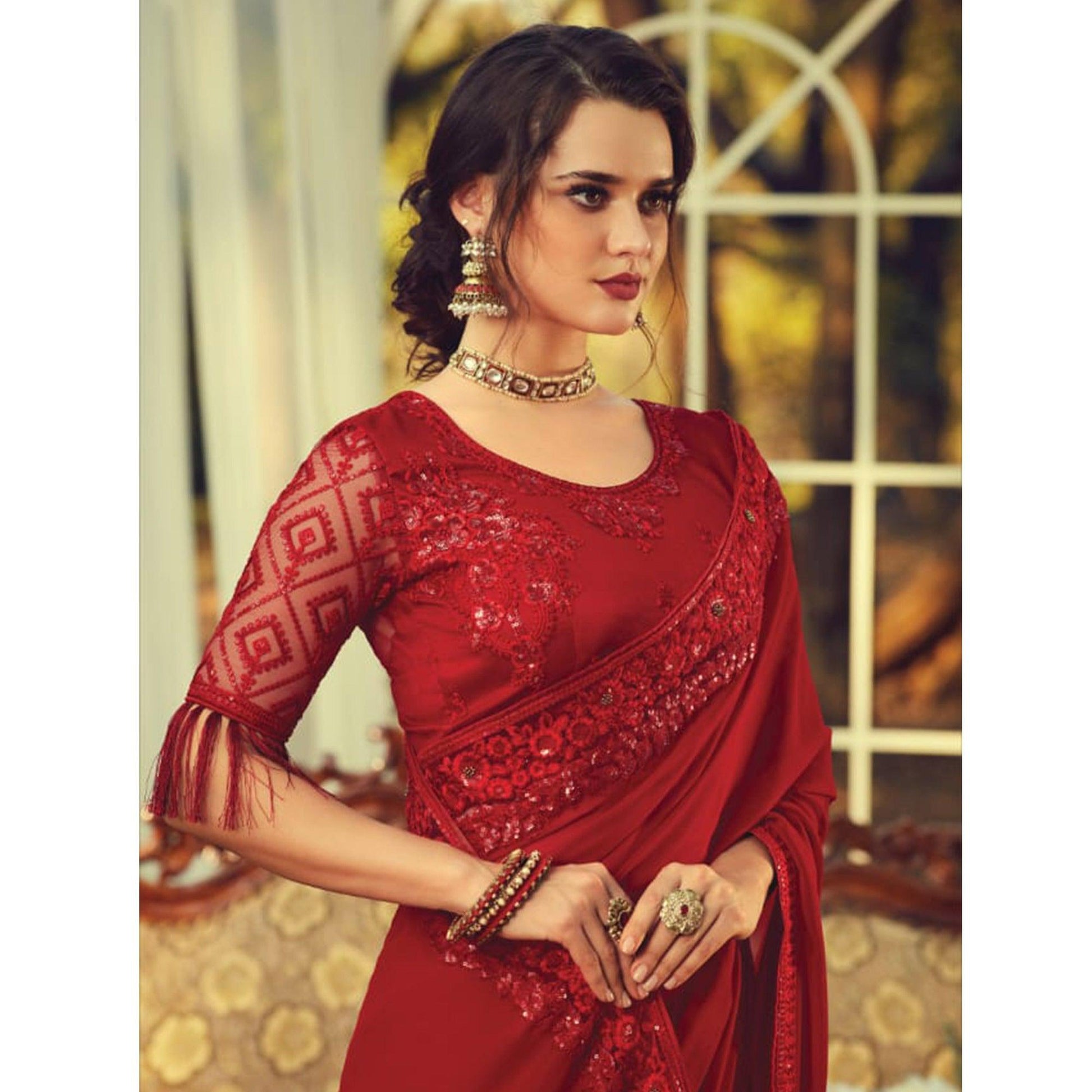 Classy Maroon Colored Partywear Embroidered Georgette Saree