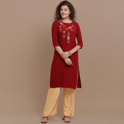 Classy Maroon Colored Partywear Floral Embroidered Rayon Kurti