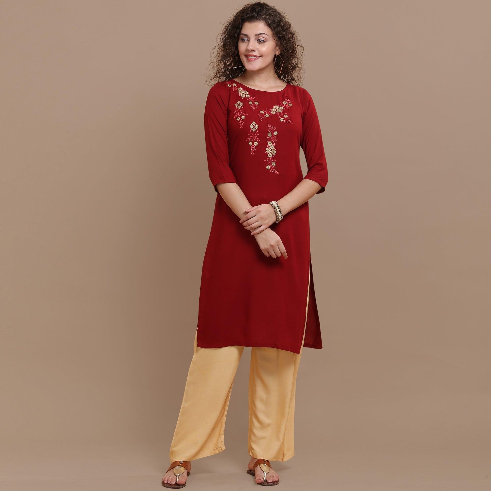 Classy Maroon Colored Partywear Floral Embroidered Rayon Kurti