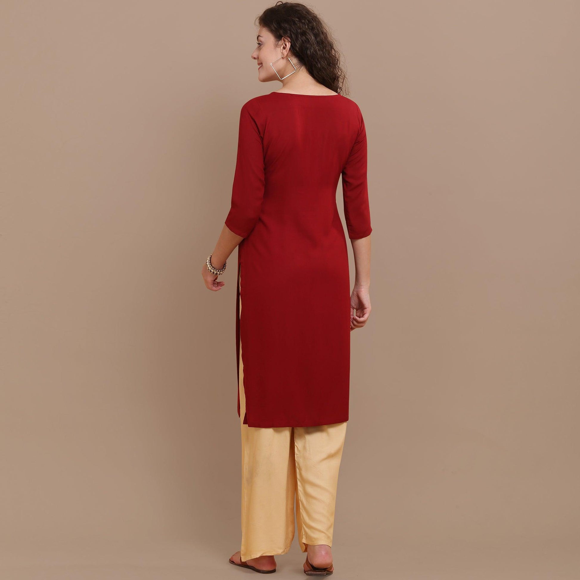 Classy Maroon Colored Partywear Floral Embroidered Rayon Kurti