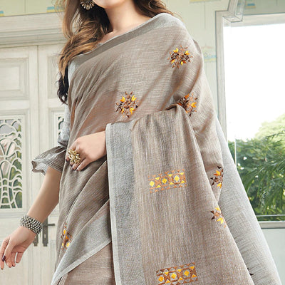 Classy Pastel Brown Colored Casual Wear Floral Embroidered Linen-Cotton Saree With Tassels