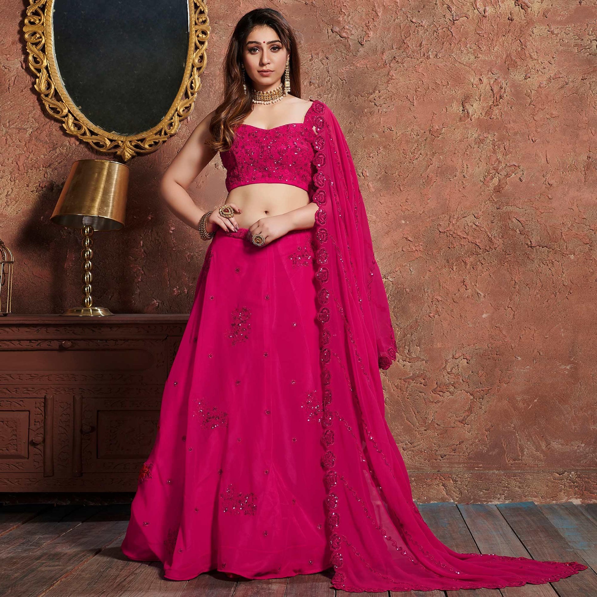 Classy Pink Colored Wedding Wear Embroidered Georgette Lehenga Choli