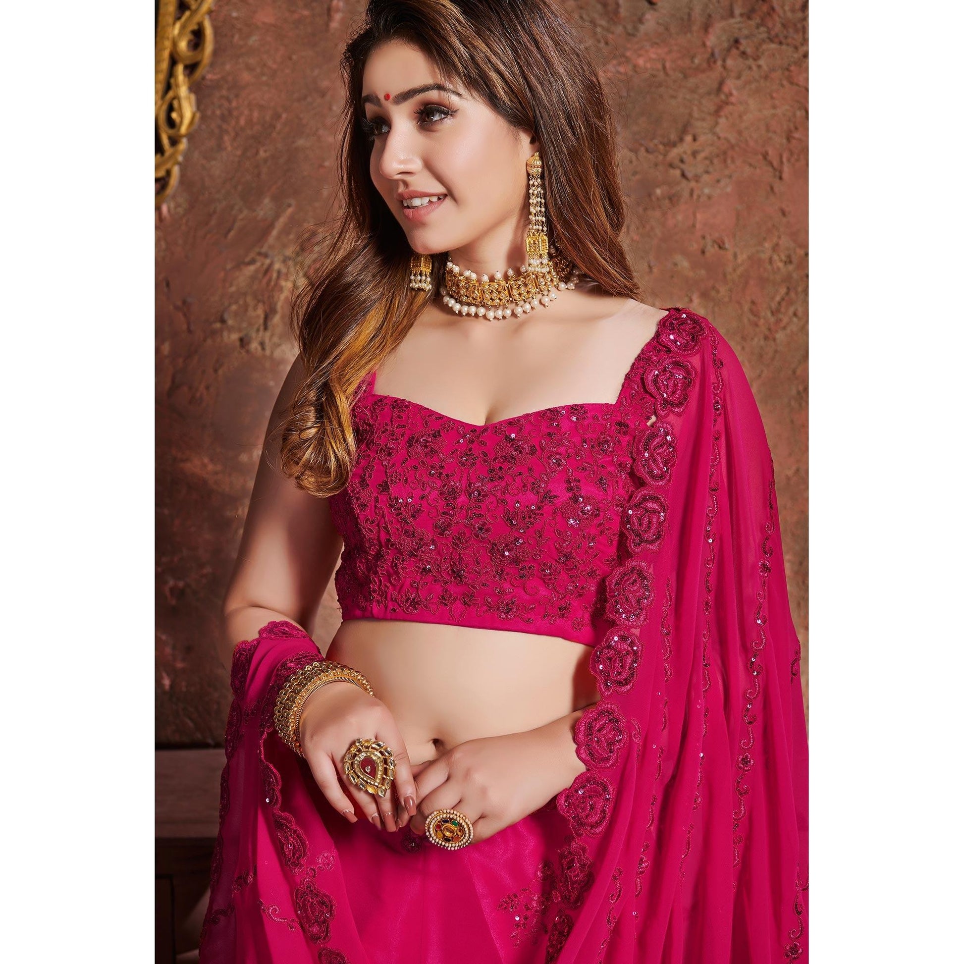 Classy Pink Colored Wedding Wear Embroidered Georgette Lehenga Choli