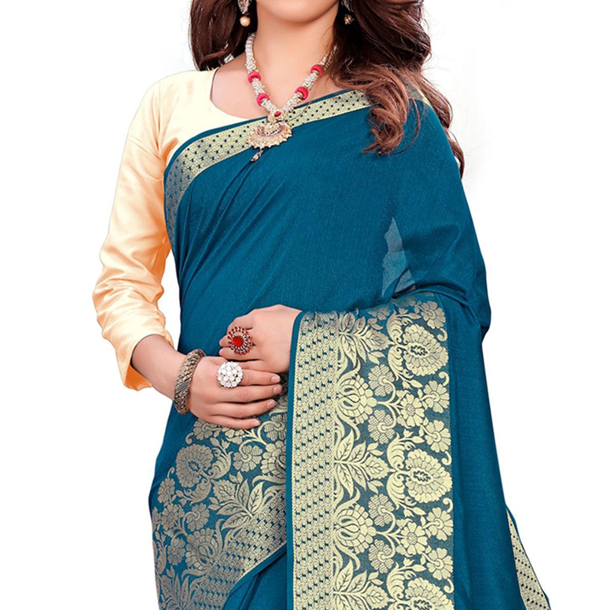 Classy Teal Blue Colored Festive Wear Woven Art Silk Saree With Tassels