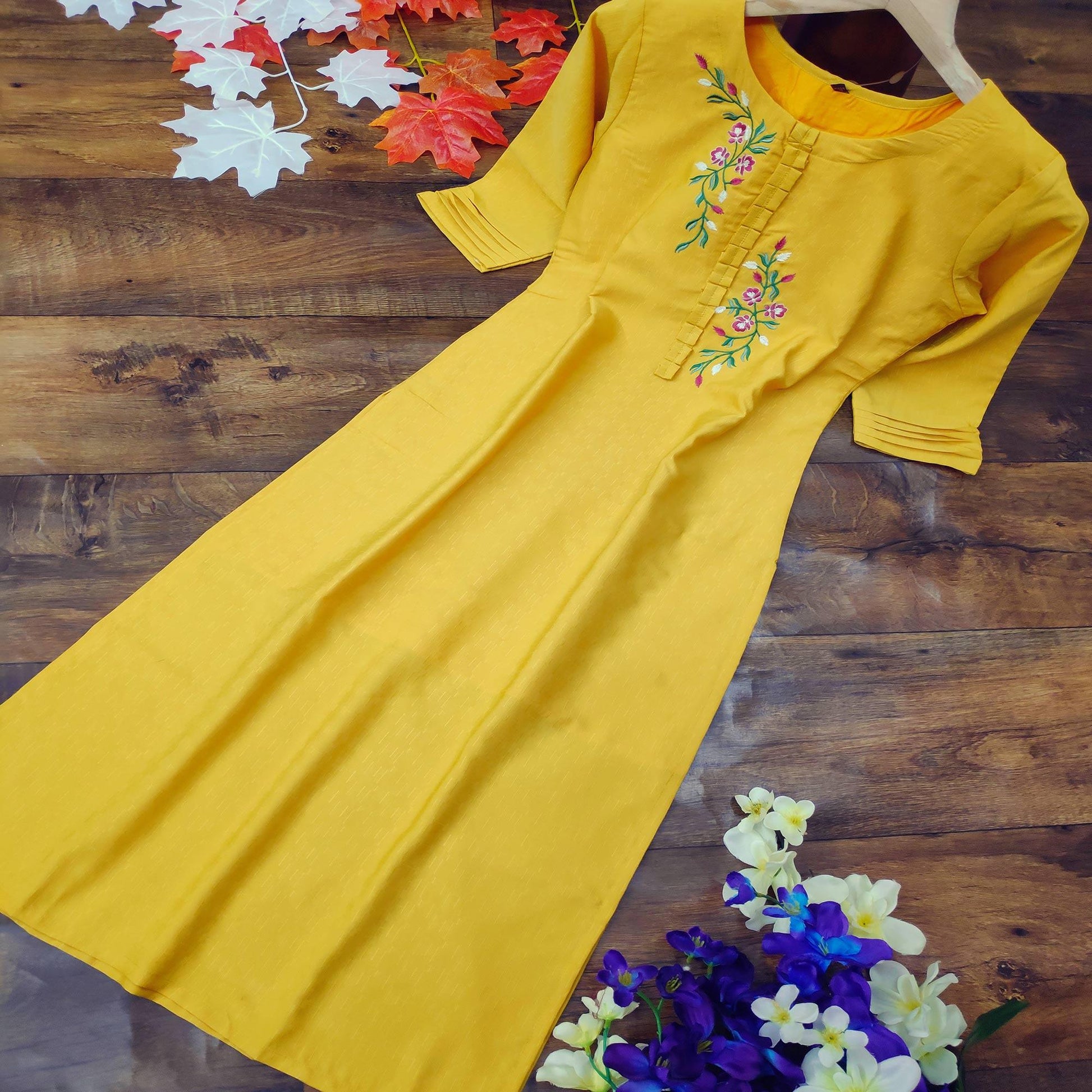 Classy Yellow Colored Party Wear Embroidered Cotton Kurti